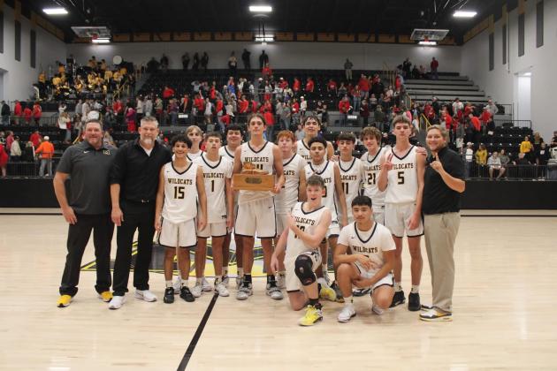 The Madill Wildcats beat the Kingston Redskins 53-51 in a triple OT game on December 5, taking home the coveted Golden Shoe. (Summer Bryant)