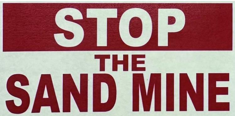 Signs against the proposed sand mine can be seen all over Marshall County. Courtesy photo